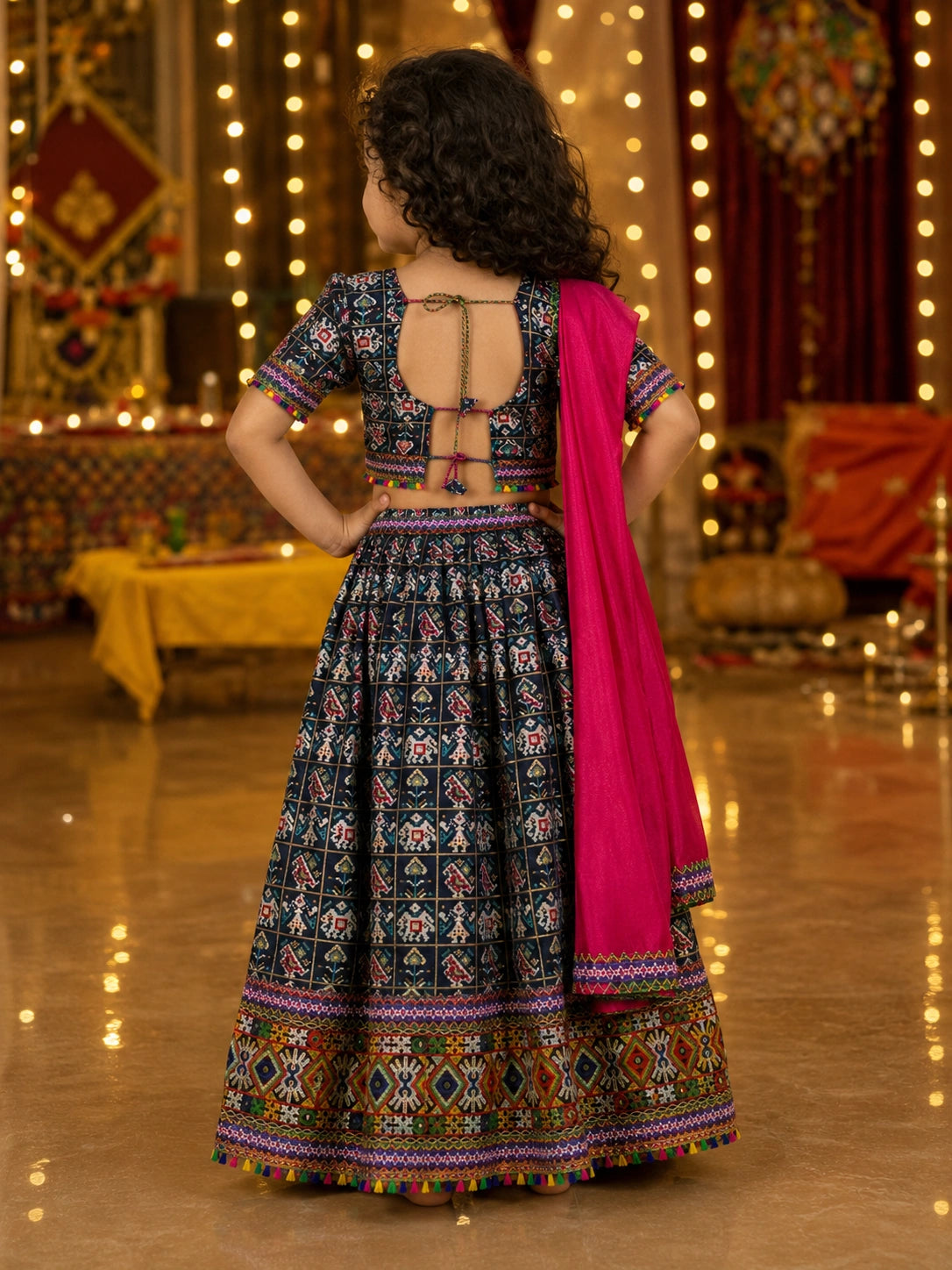 Navy Blue Kaju Katri Patola Lehenga Choli - Girl Back View at Garba