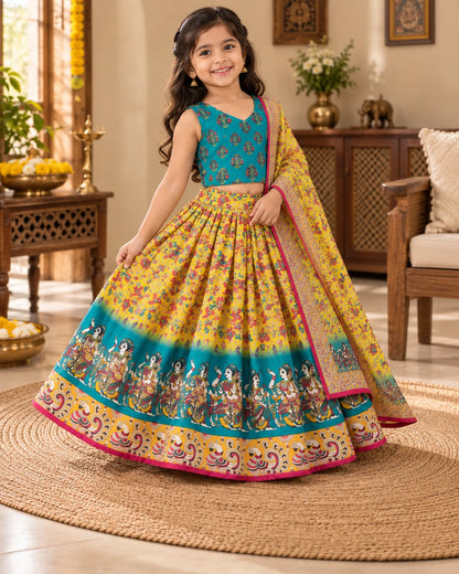 Yellow and teal printed girls lehenga choli set displayed flat