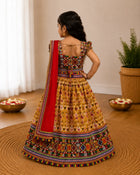 Mustard Kaju Katri Patola Lehenga Choli - Flat Lay on Rattan Tray
