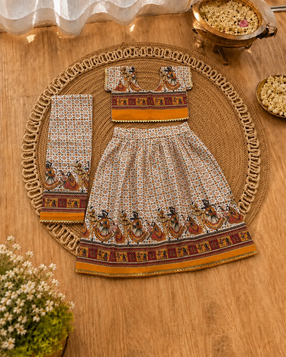 Orange Dandiya Print Lehenga Choli - Girl Twirling