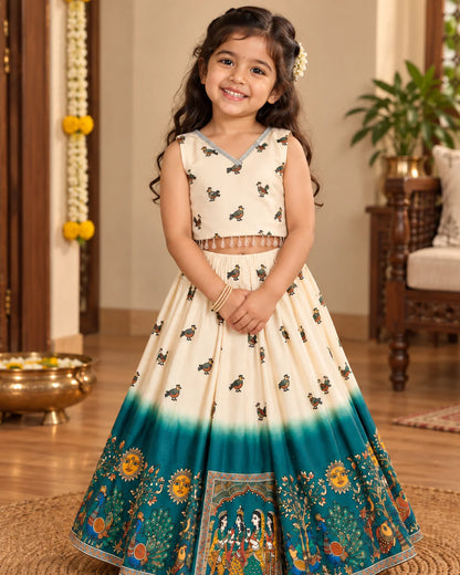 Girl twirling in a cream and teal lehenga choli set with dupatta