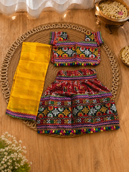 Red Patola Lehenga Choli Set - Girl Front View at Garba