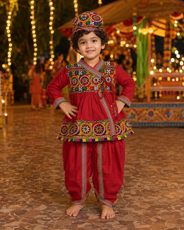Red Kediyu Dhoti Set with Cap – Boy running festive view