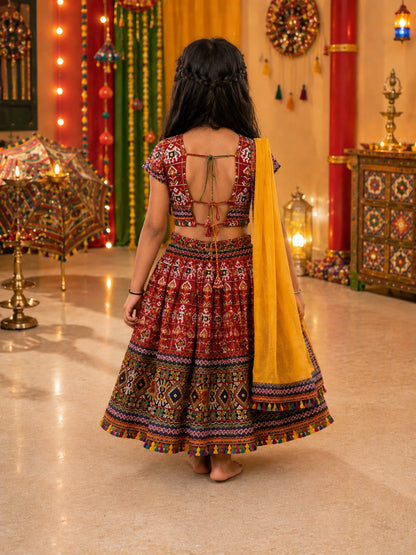 Red Kaju Katri Patola Lehenga Choli - Girl Front View Smiling at Festive Night