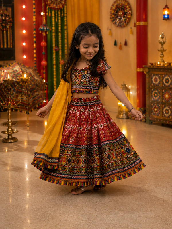 Red Kaju Katri Patola Lehenga Choli - Girl Twirling at Festive Night