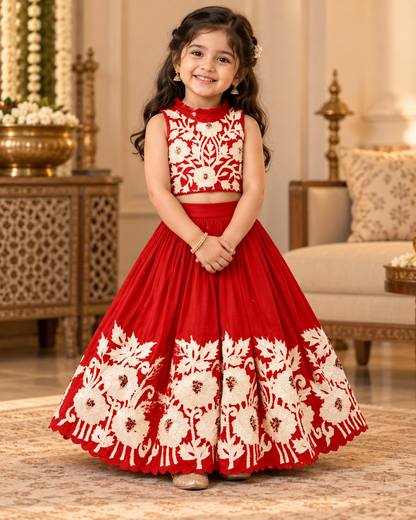 Girl in royal red embroidered lehenga set, front view