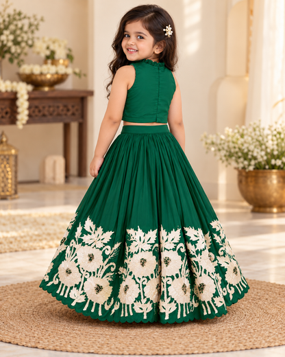 Girl smiling in royal green embroidered lehenga set