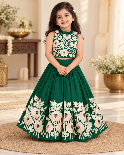 Royal green embroidered lehenga set laid flat