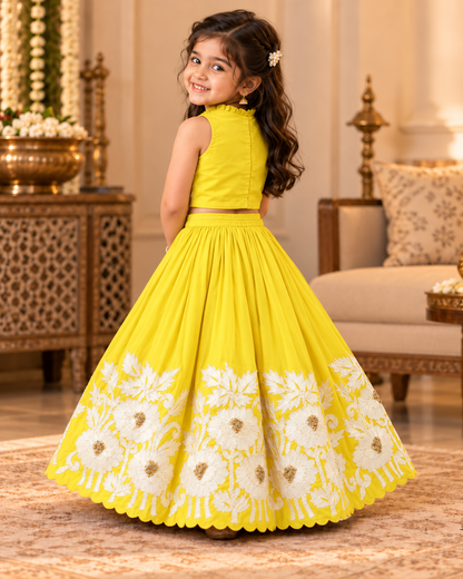 Royal yellow embroidered lehenga set laid flat