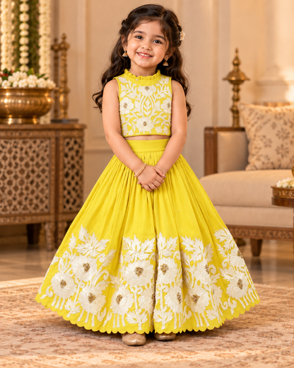 Girl in royal yellow embroidered lehenga set, back view